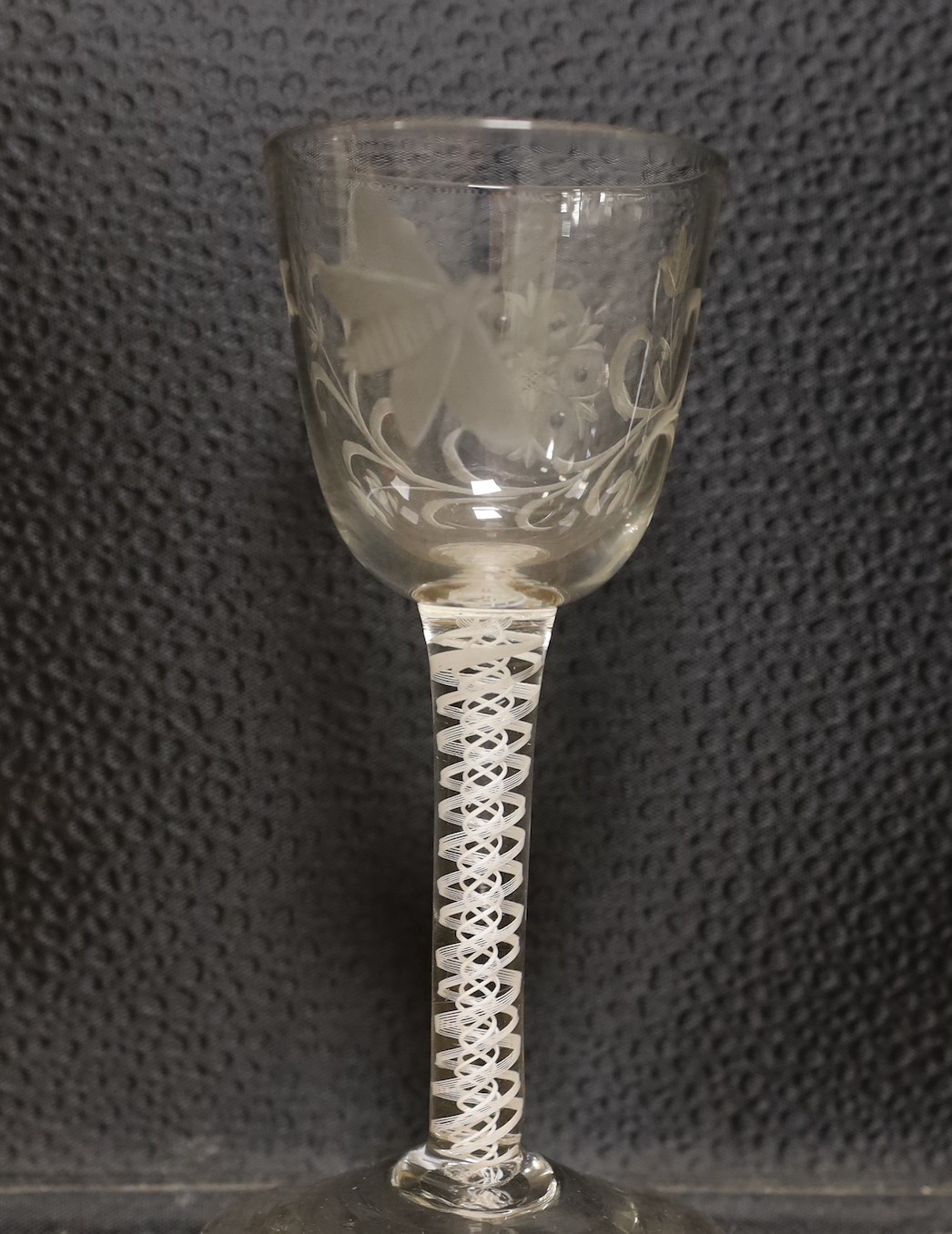 Three 18th century Jacobite type double series opaque twist stem wine glasses, 15cm tall